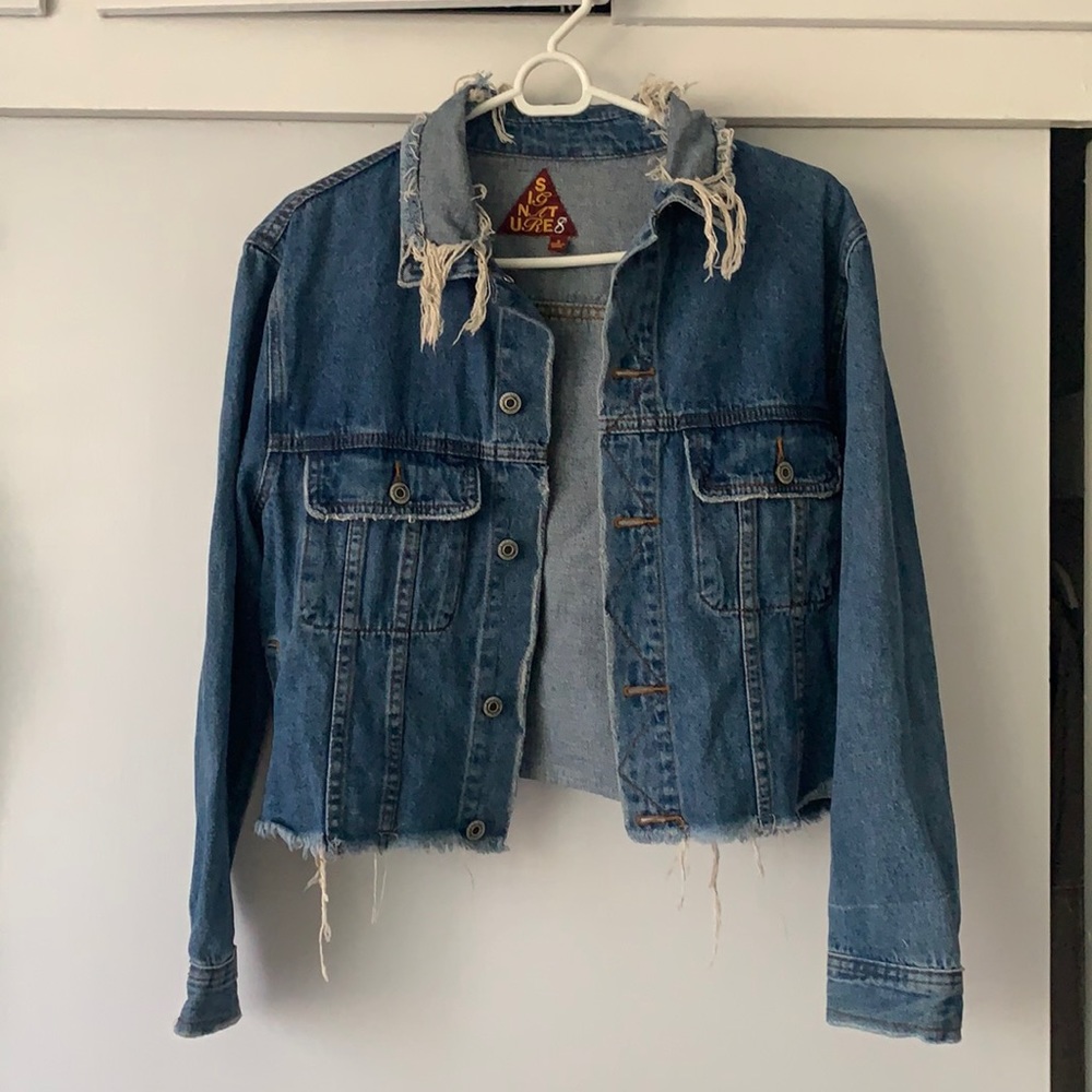 Distressed denim jacket